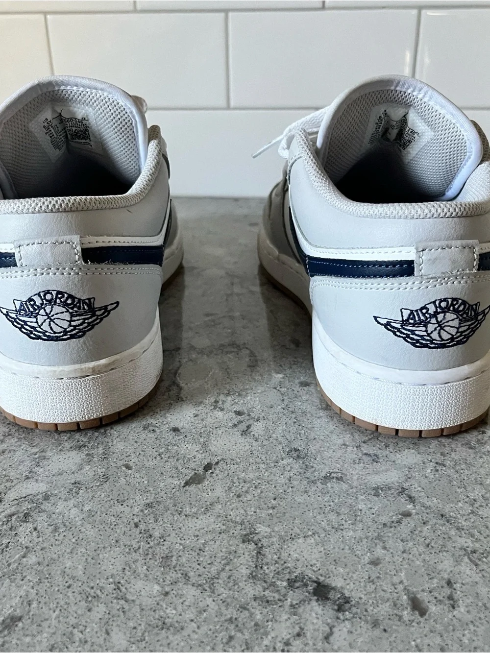 Nike Kids White Sneakers with navy Swoosh